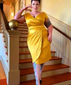 What's New, Pussycat? Ava Faux Wrap Wiggle Dress In Golden Mustard Satin | Pinup Couture