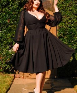 Pinupgirlclothing.com Kara Swing Dress In Black Crepe And Chiffon Sleeves | Laura Byrnes Design What's New, Pussycat?