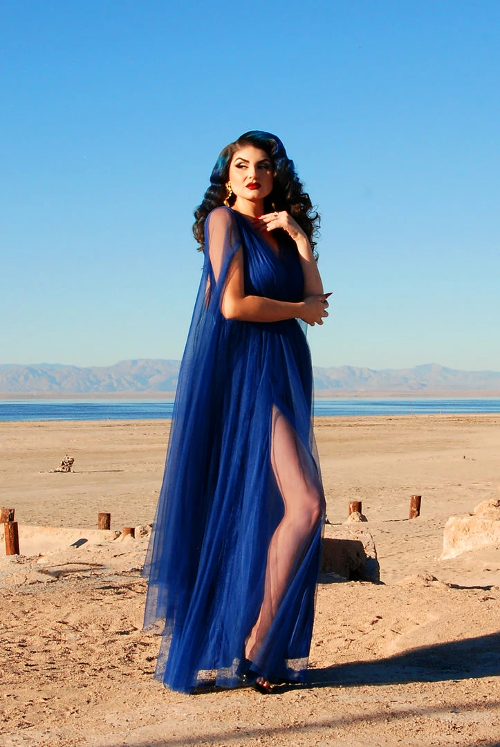 Rubber Ducky Gothic Glamour Bombshell Gown In Blue With Floor Length Sheer Cape Sleeves What's New, Pussycat? 6 Rubber Ducky Gothic Glamour Bombshell Gown In Blue With Floor Length Sheer Cape Sleeves What's New, Pussycat?